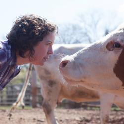 Corinna Burns with a cow for Charolais.  Photo: Plate 3